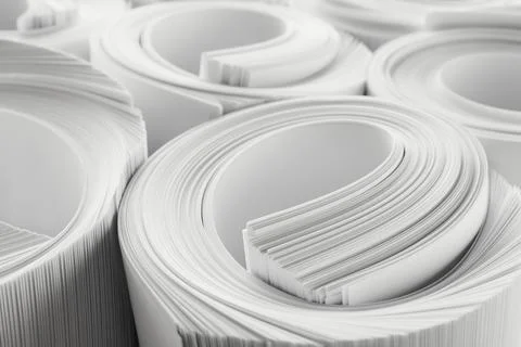 Rolled white paper sheets as background, closeup Stock Photos