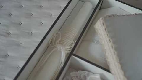 Rolled white scroll tied with string in gift box Stock Footage 327830213