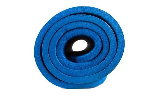 Rolled yoga mat for exercise Stock Photos