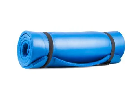 Rolled yoga mat for exercise Stock Photos