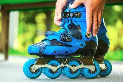 Roller adjusting buckle on inline roller skates. Stock-Fotos
