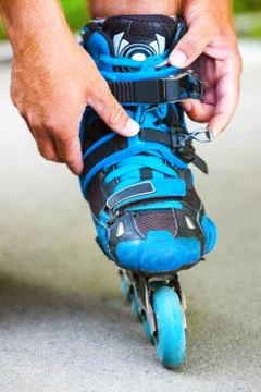Roller adjusting buckle on inline roller skates. Stock Photos