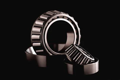 Roller bearings close-up on a black background, selective focus, toning Stock Photos