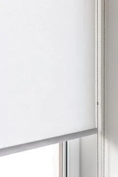 Roller blind white color close-up on the window Stock Photos