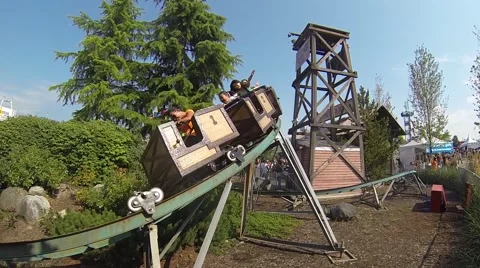 Roller Coaster at an amusement park Stock Footage 41442459
