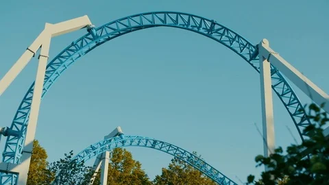Roller coaster in an amusement park Stock Footage 91607763