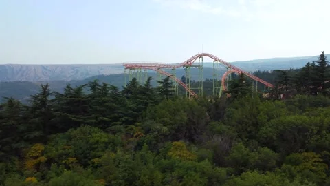 Roller coaster in the amusement park Stock Footage 168627618