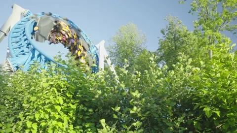 Roller coaster in the amusement park Stock Footage 238993652