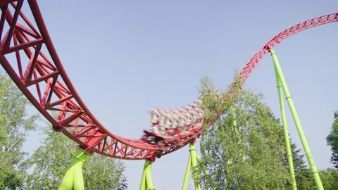 Roller coaster in the amusement park Stock Footage 265228911