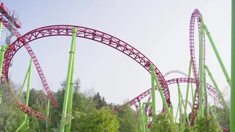 Roller coaster in the amusement park Stock Footage 265228950