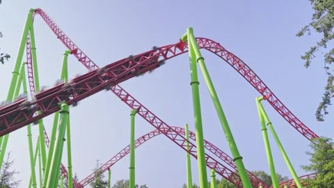 Roller coaster in the amusement park Stock Footage 265229261