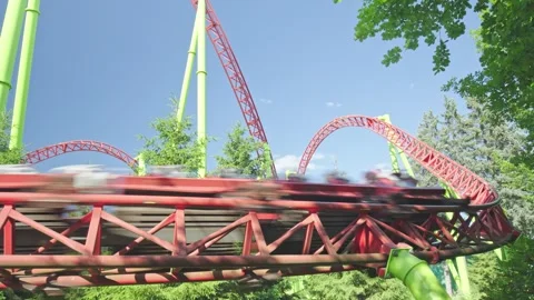 Roller coaster in the amusement park Stock Footage 278967354