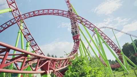 Roller coaster in the amusement park Stock Footage 278972449
