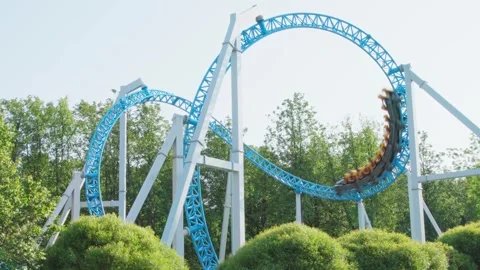 Roller coaster in the amusement park Stock Footage 312910554