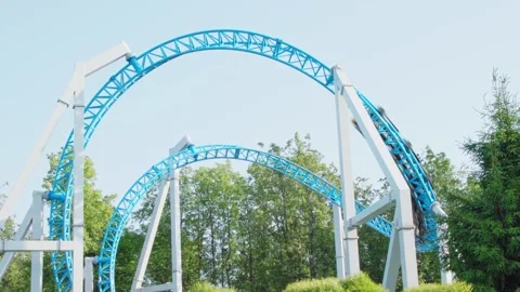 Roller coaster in the amusement park Stock Footage 312910655