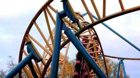 Roller Coaster in Amusement Park Rides Against Sky Video stock 58200250