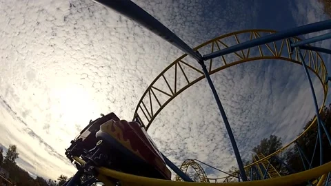 Roller coaster in amusement park sky background Stock Footage 144987350