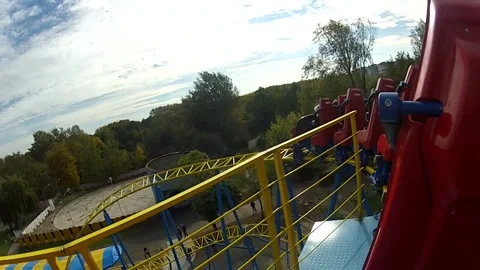 Roller coaster in amusement park sky background Stock Footage 144987428