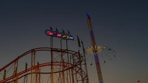 Roller Coaster and Aeronaut ride Stock Footage 120123927