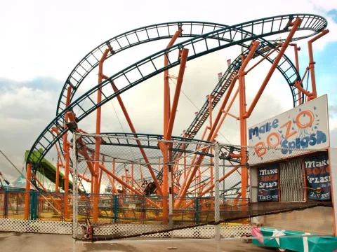 Roller coaster and dunking game Stock Photos
