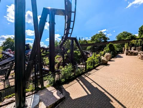 Roller Coaster Attractions At A Theme Park On A Sunny Day Stock Photos