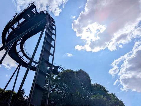 Roller Coaster Attractions At A Theme Park On A Sunny Day Stock Photos