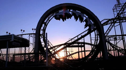 Roller coaster with blue sky. Amusement park. Video stock 53298938