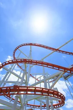 Roller coaster lines in blue sky Stock Photos