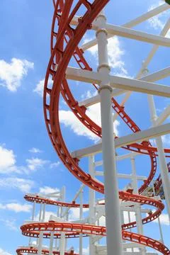 Roller coaster lines in blue sky Stock Photos