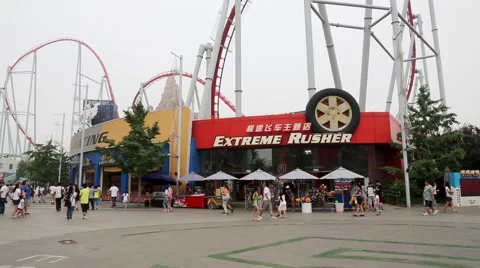 Roller coaster restaurant KFC in the amusement park Happy Valley Beijing Stock Footage 57868163