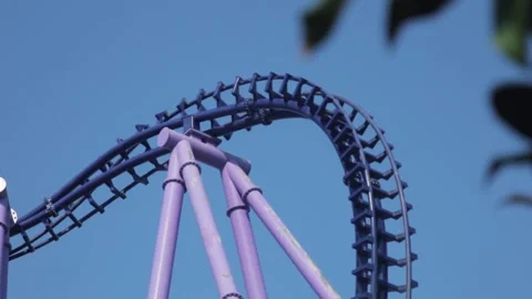 Roller Coaster Ride on Bright Blue Sky Background Stock Footage 155395233