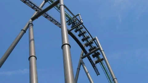 Roller coaster ride on the edge. Theme park rides. Thrill amusement park. Stock Footage 132608848