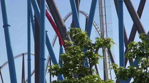 Roller coaster ride pillars and cars mov... | Stock Video | Pond5