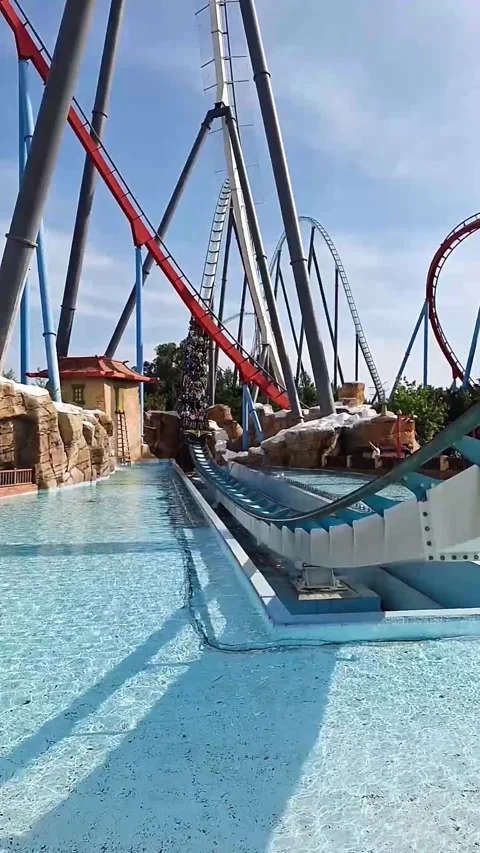 Roller Coaster Shambala Over Water in Port Aventura Park Stock Footage 277357434