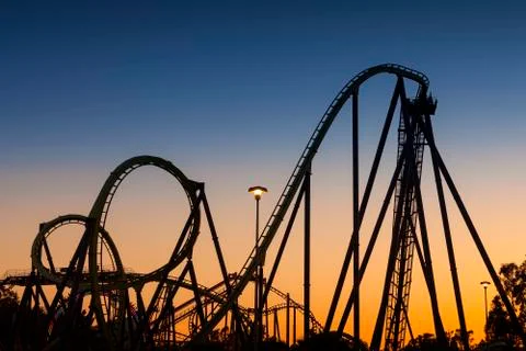 Roller Coaster Silhouette at Sunset Stock Photos