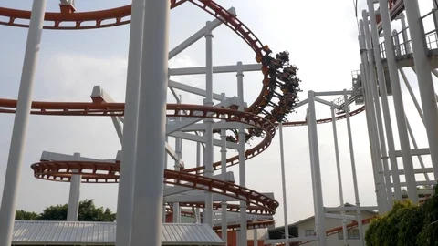 Roller coaster train following it's roller coaster circuit, Dream World, 스톡 동영상 101371331