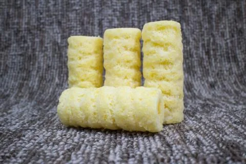 Roller corn snack, snack from corn product Stock Photos