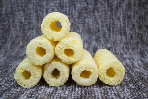 Roller corn snack, snack from corn product Stock Photos