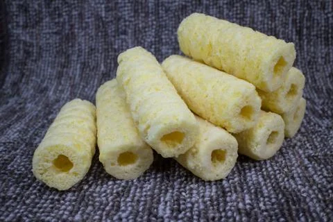 Roller corn snack, snack from corn product Stock Photos