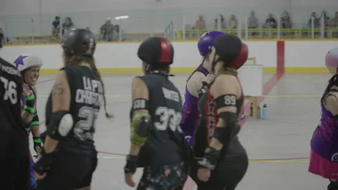 Roller derby pre game high five Stockbeeldmateriaal 232537859
