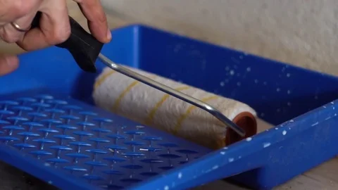 The roller dip into the paint Video stock 82735564
