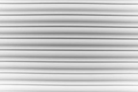 Roller door or roller shutter texture consist of roll formed steel Stock Photos