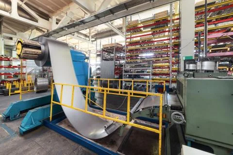Roller forming machine. The interior of the plant producing a metal profile. Stock Photos