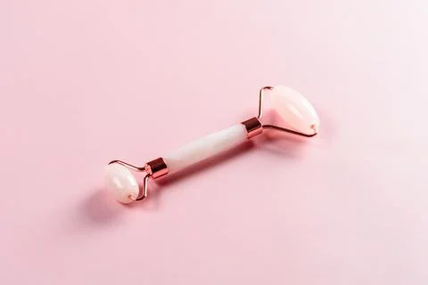 Roller massager for the face. Stock Photos