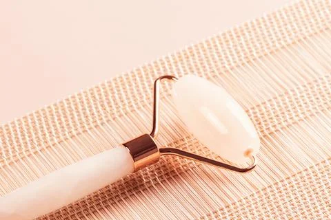 Roller massager for the face. Stock Photos