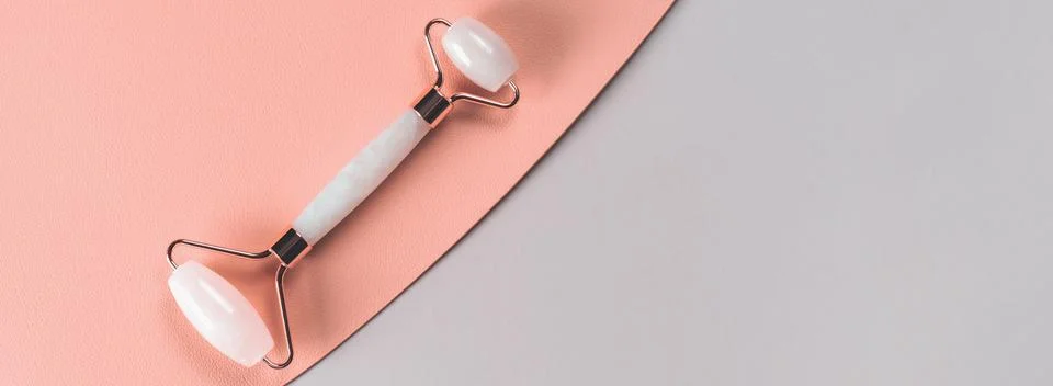 Roller massager for the face. Stock Photos