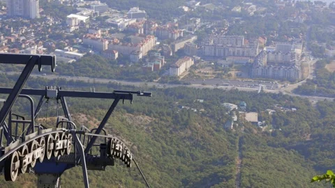 Roller mechanisms on the funicular pole. Moving the rope on a modern rope lift. Stock Footage 272481518