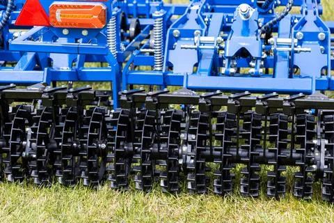 Roller packer machinery with metal ring rollers Stock Photos
