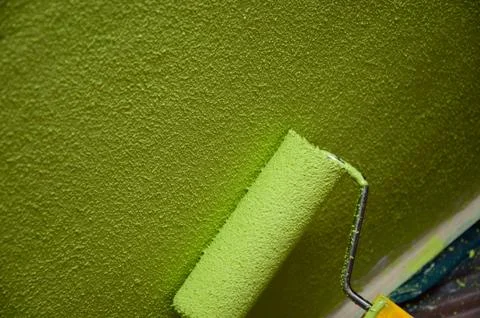 Roller paint with green texture paint 写真素材