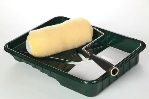 Roller with paint roller pan Stock Photos